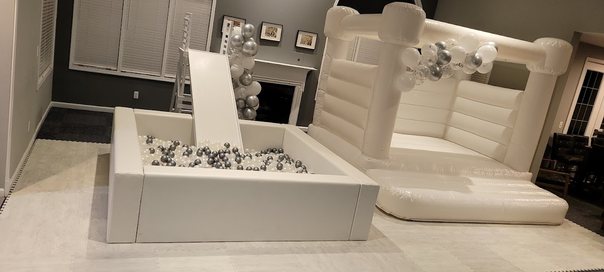 custom white and silver ball pit and bounce house